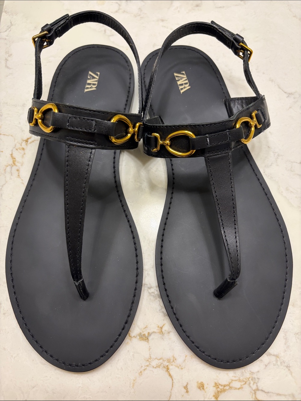 ZARA Black T-Strap Sandals with Gold Ring Accents